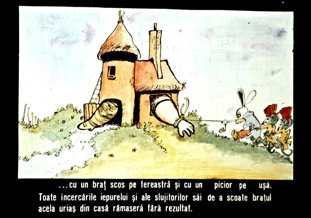 O ilustrație cu o casă și un braț care apare pe fereastră, alături de iepuri care încearcă să ajute.