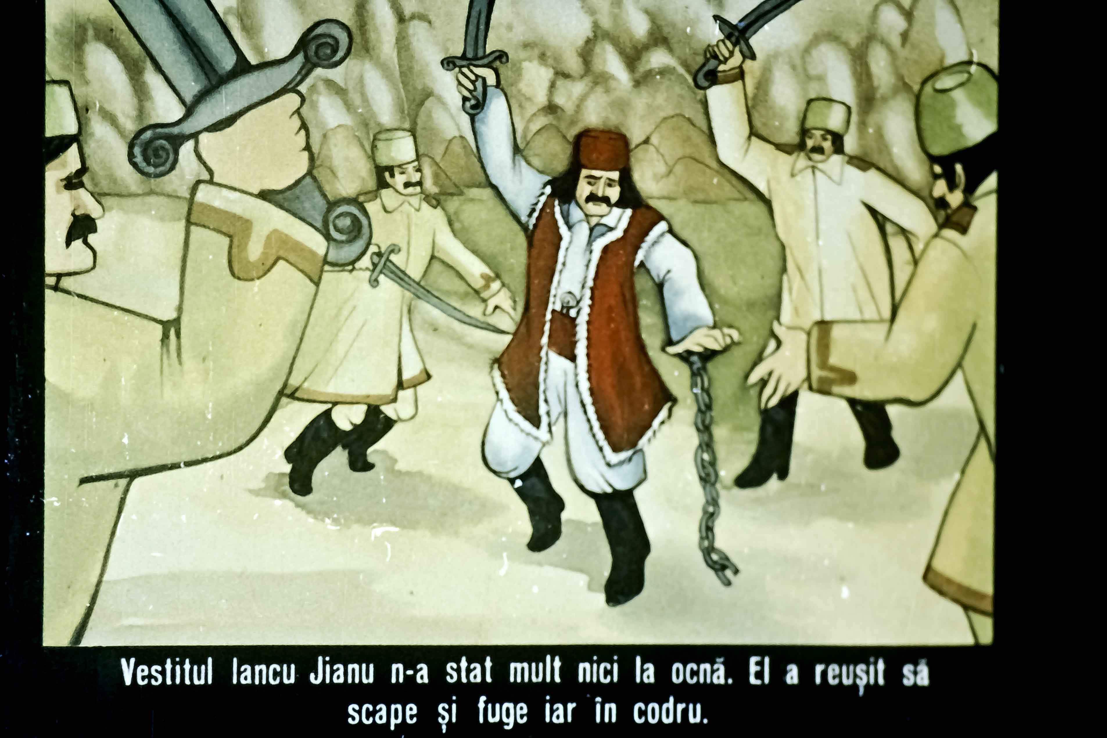 Imagine care ilustrează o scenă istorică în care un personaj principal, Jianu, se află într-o situație tensionată, cu mai multe figuri în jurul său, fiecare purtând săbii.