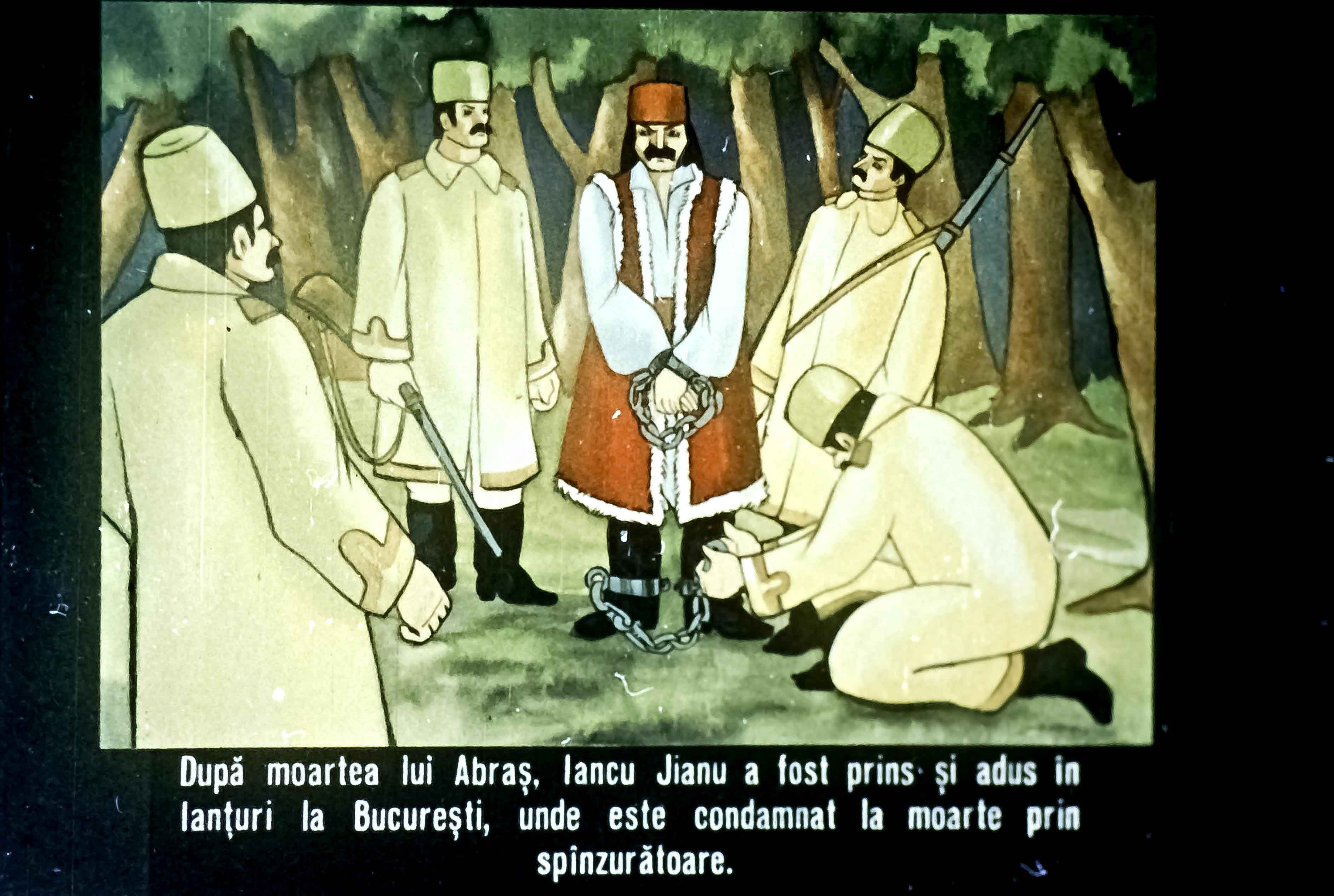 Imagine ilustrează o scenă istorică în care lianiu Jianu este prins și condamnat la moarte, înconjurat de soldați.
