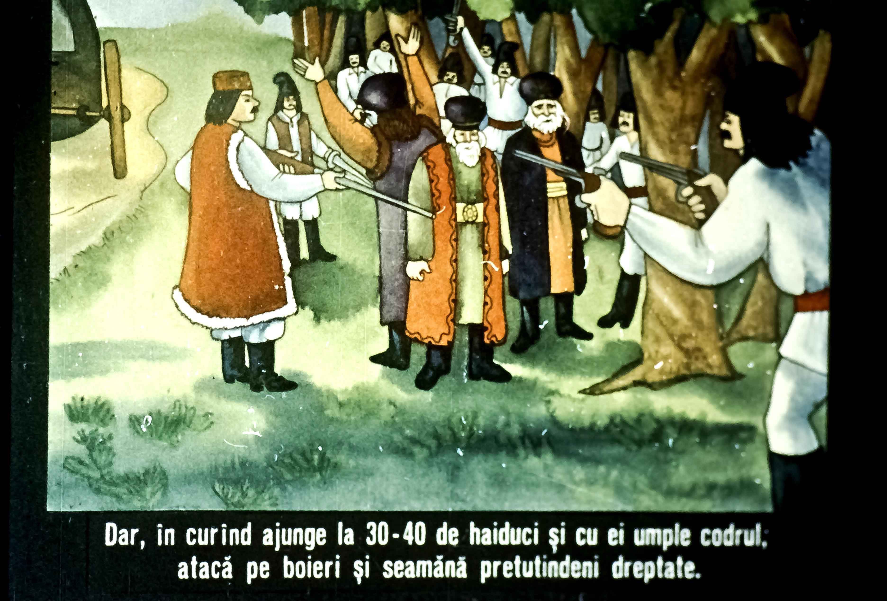 Ilustrație cu haiduci care atacă boieri în pădure, cu text explicativ despre eveniment.